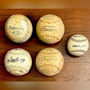 4 softballs and one baseball